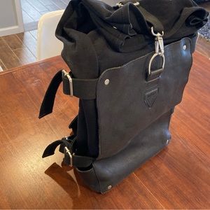 John Fluevog black leather and canvas backpack.
